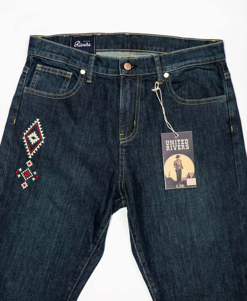 United Rivers Kansas River dark denim jeans  with five-pocket with zipper fly and signature snap rivets